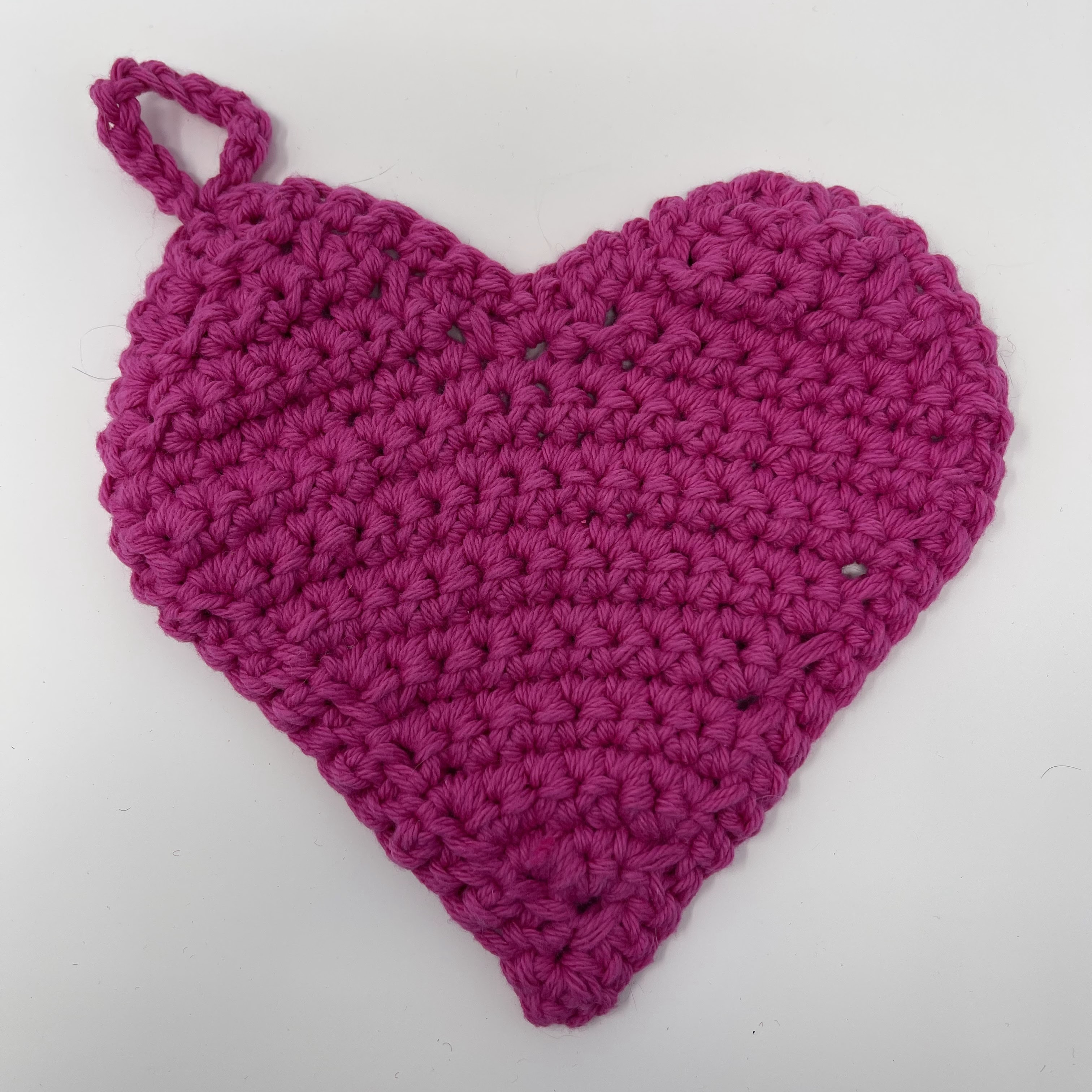 #37 Bright pink crocheted heart with loop for hanging.9x8x0.5"