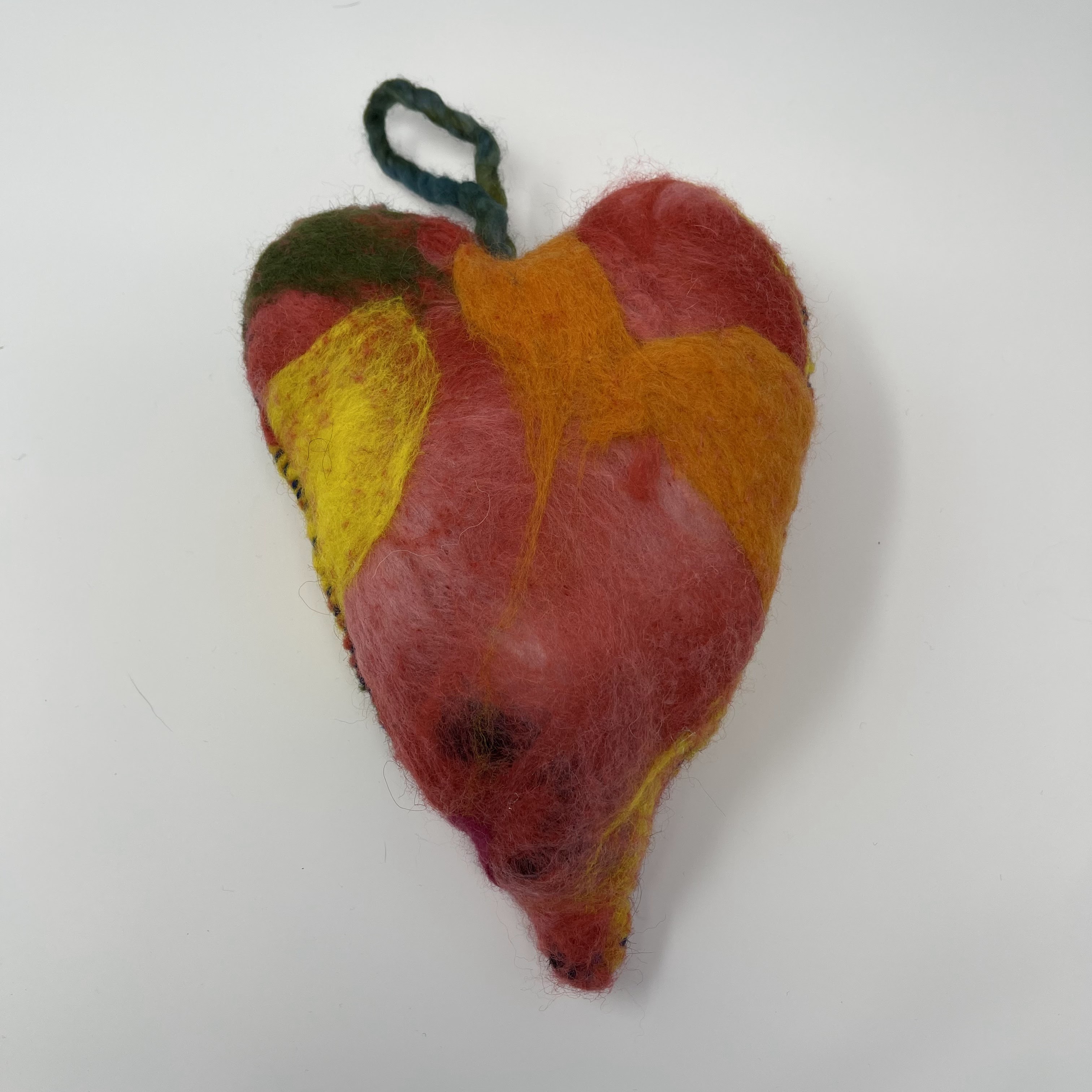 #39 Stuffed felted heart. Orange,pink, yellow, and green. 10x7x4"