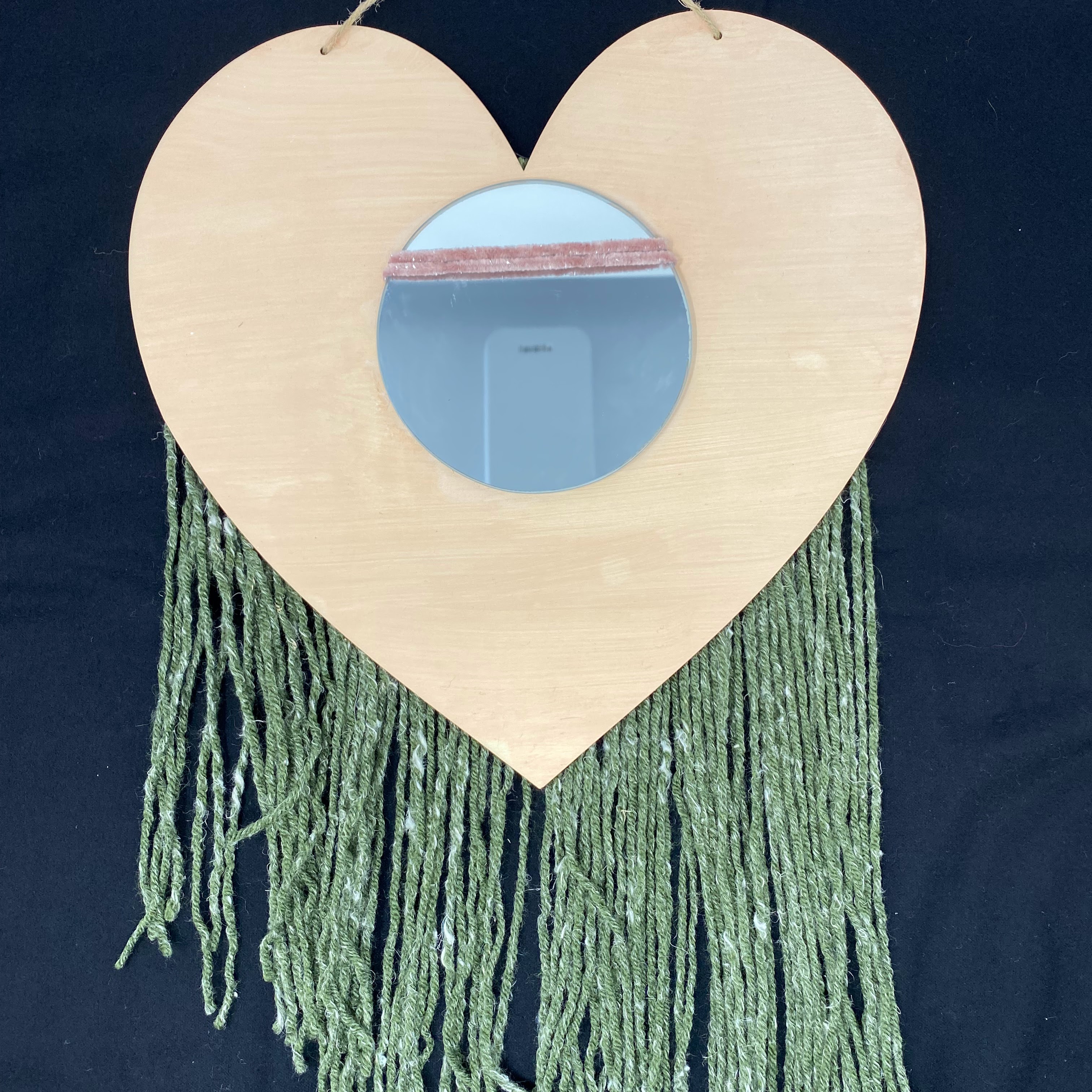 #61 Wood heart wall hanger with circle mirror decorated with pink fiber and green fringe