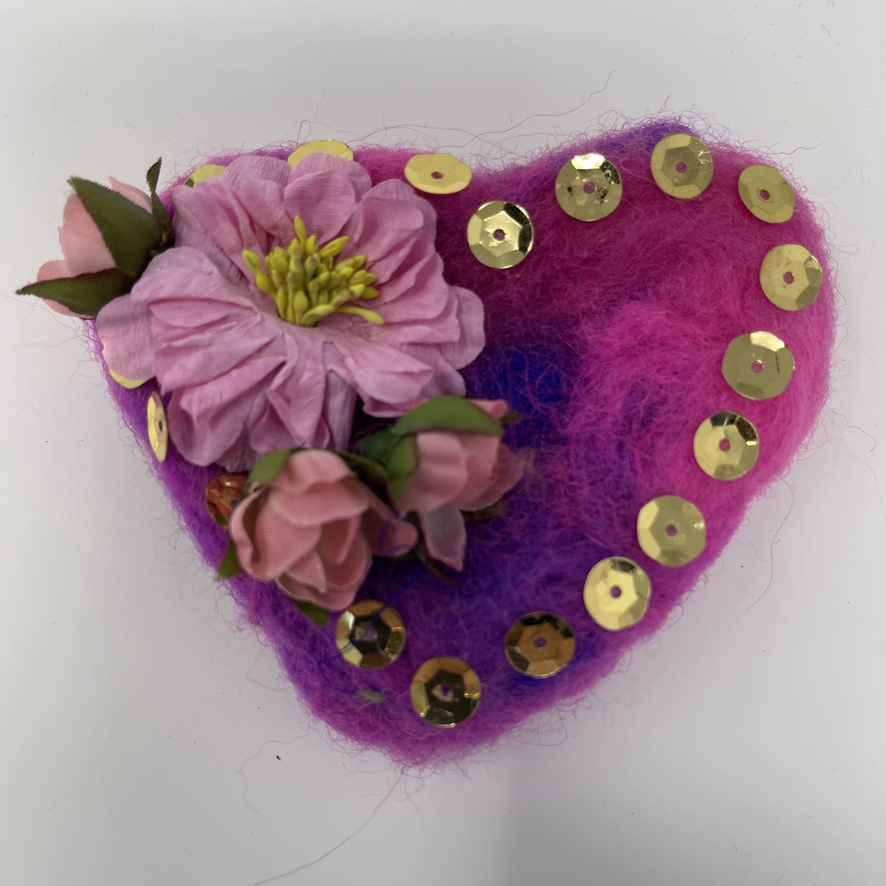 #64 Needle felted heart. Pink and purple with flowers and gold sequins. 4x4x1"