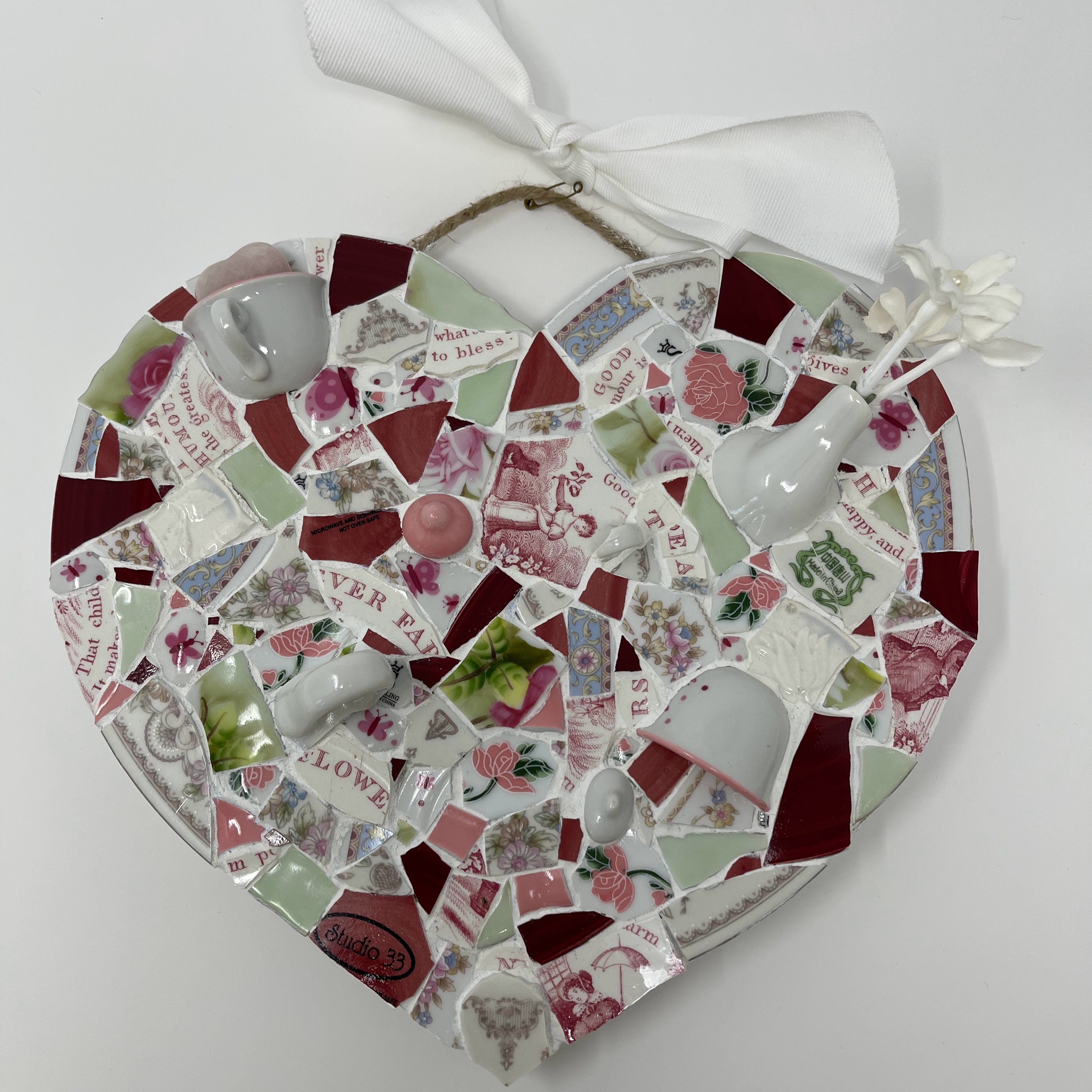 #68 Mosaic heart made from pieces of teapots, teacups, and saucers