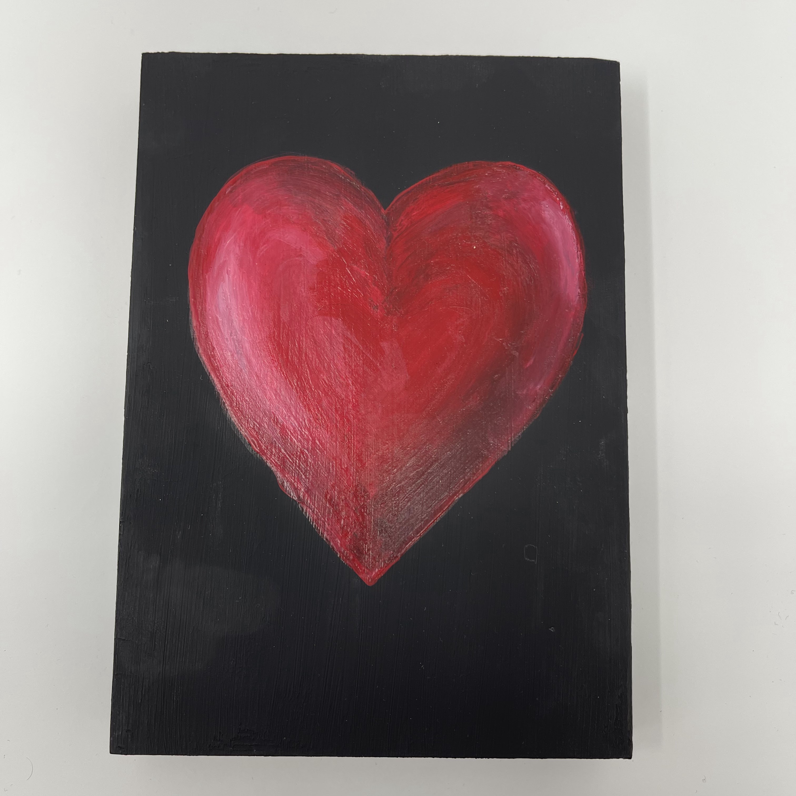 #73 Painted red heart on black wood canvas