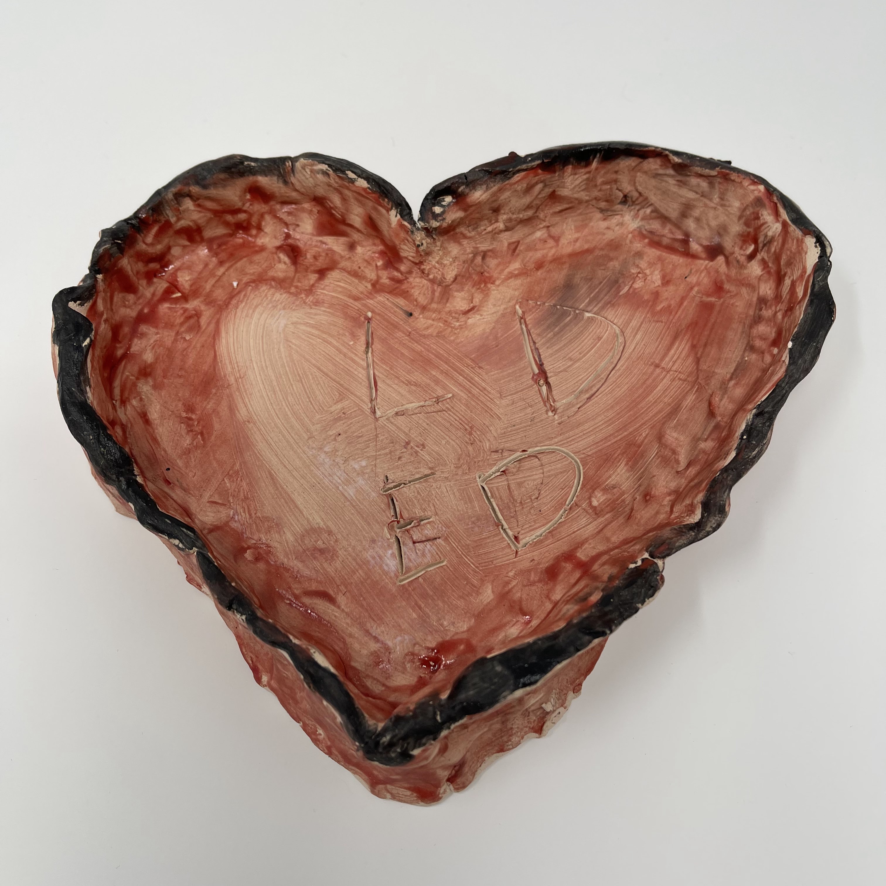 #76 Ceramic heart dish, pink with black outline glaze